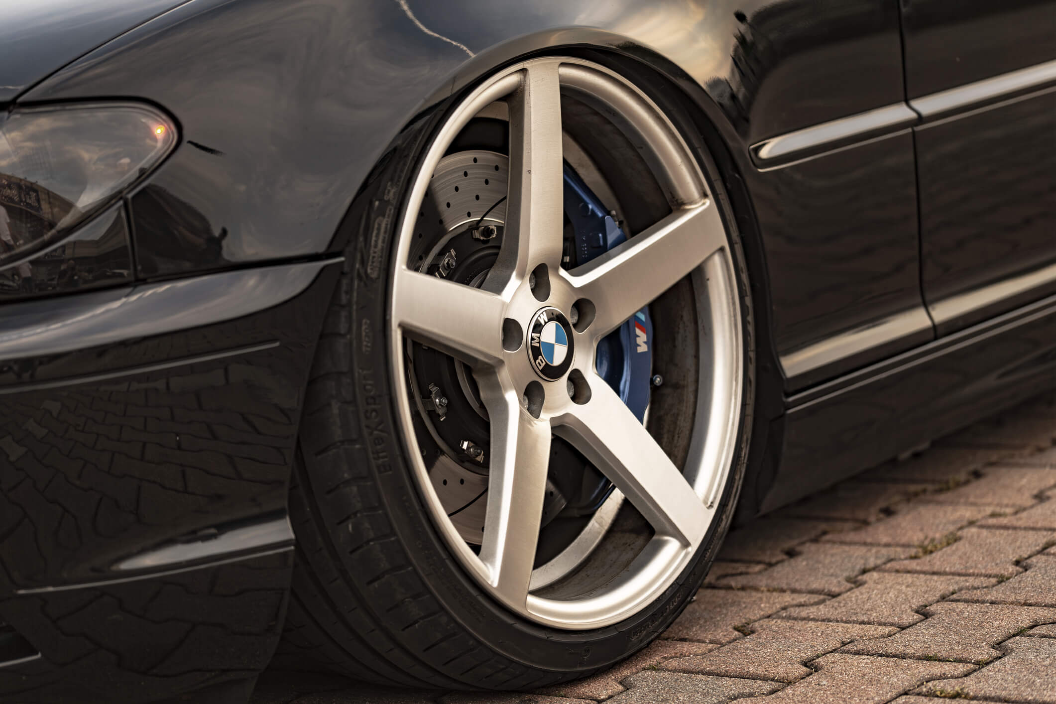 All European Auto Repair Las Vegas technicians performing a professional brake inspection for a BMW in Las Vegas Nevada